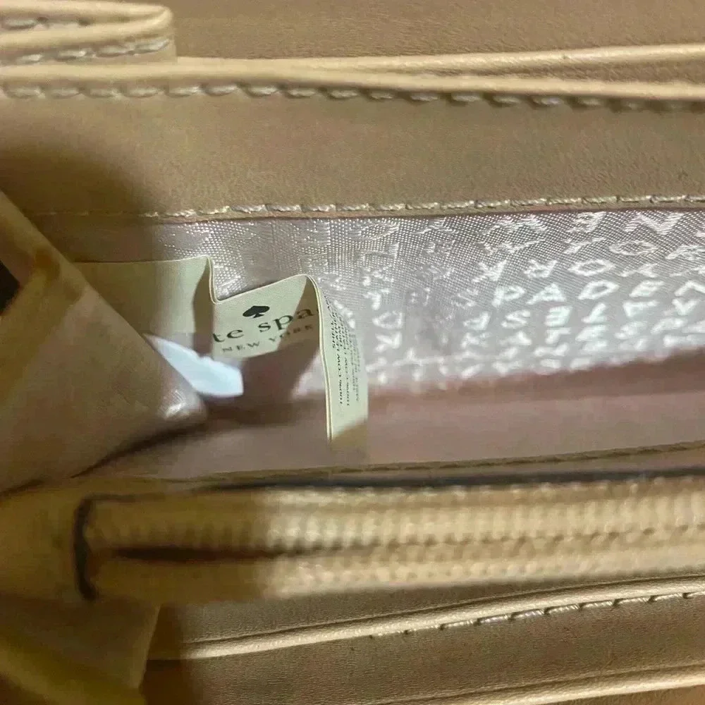 Kate spade metallic bronze leather wallet
